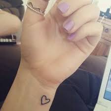 27.a tiny bunny and moon: 10 Small Heart Wrist Tattoo Ideas Heart Tattoo Tiny Tattoos Mini Tattoos