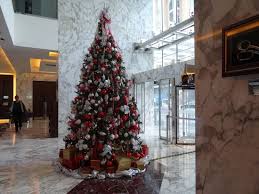 So much inspiration for decorating your own tree this holiday season!. Beautiful Christmas Trees In Different Areas Of Hotel Picture Of Bonnington Jumeirah Lakes Towers Dubai Tripadvisor