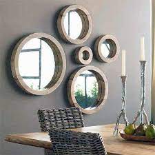 Surya wall decor wall mirror in gold. Throw Your Room A Curve Round Mirrors Mirror Wall Decor Mirror Decor Porthole Mirror