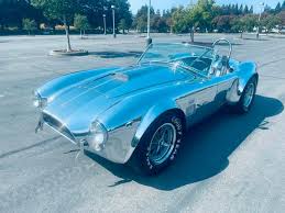 Image result for Rosso Chiaro 1965 AC Cars
