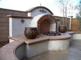 See more ideas about patio, spanish style homes, spanish house. Element Construction Blog Spanish Style Fire Pit With Water Feature And Vases Spanish Style Fire Pit With Water Feature Patio Fireplace