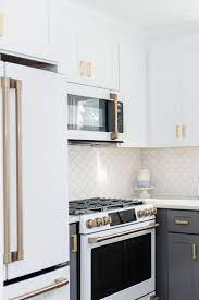Cafe quality enjoy the design, style and quality of a cafe appliance on your countertop thanks to a toaster that comes in stainless steel, matte black and matte white finishes, all with signature copper accents; My White Gold Kitchen With Cafe Appliances White Kitchen Appliances Gold Kitchen Condo Kitchen