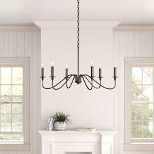 A new edition to the @noorofmyhome influencer collection, the scrolled wood arms, the distressed metal, and candle sleeves of this savannah chandelier create the rustic look of this chic cottage piece. Candle Chandeliers Free Shipping Over 35 Wayfair