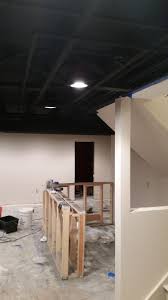 Exposed Basement Ceiling Sprayed Black Diy Low Ceiling Basement Basement Remodeling Exposed Basement Ceiling