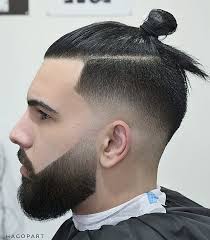 The man bun n taper fade style is the best combination you can have for a new look. 20 Best Samurai Bun Haircut How To Get Tie Man Bun Atoz Hairstyles