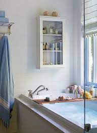 I may have mentioned before that i do love a bathroom that doesn't necessarily look like a bathroom. Glass Front Medicine Cabinet Over Bathtub Cottage Bathroom