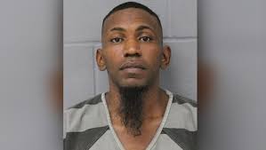 Austin murder suspect sat