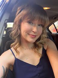 Hello. I like this pic but it's obvious that I am in a car. I would like to  use this pic as my professional headshot. Can someone help with this  request? AMOU