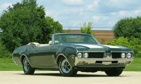 Image result for Scaraba Green 1930 Oldsmobile