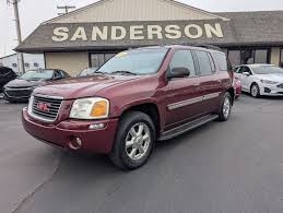 Image result for Red 2003 Envoy