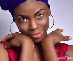 peace samuel omana is a nigerian model with multi colored eyes