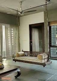 This swing has a huge carrying capacity os 300 kgs. Wooden Jhoola Swing For Living Room Or Balcony Balcony Patio Porch Home Decor Furniture Design Living Room Indian Living Rooms Living Room Furniture Chairs