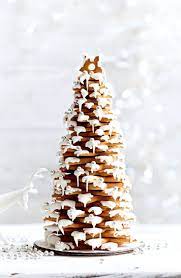 Although i'm personally not a fan of gingerbread cookies, madison loves baking them, decorating them and eating them so i bake them every year. Gingerbread Christmas Tree Recipe Gingerbread Christmas Tree Christmas Tree Cookies Christmas Tree Food