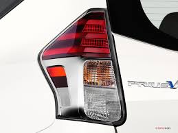 Toyota prius tail lights usually combine the purpose of stop lights and directional signals in one device; 2016 Toyota Prius V Pictures Mirror U S News World Report