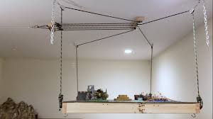 Storage space is essential as there are many items that are too big or which we do not use on a daily basis. How To Make A Pulley Winch System That Raises A Warhammer Table To The Ceiling Youtube