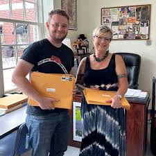IB Assistant Coordinators Marsha Moynihan and Jack Enos ready to mail the  May 2023 IB Certificates and Diplomas to the class of 2023! Congratulations  to all!