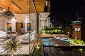 A House In Panchkula With Glass Walls And An Elevated Pool House Yard Design House Yard House Styles