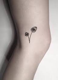 While the largest organism in the world is a mushroom, your mushroom tattoo doesn't have to follow suit. Hand Poked Small Mushrooms Tattoo Tattoogrid Net