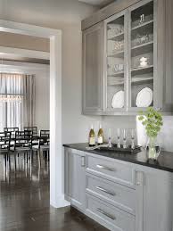 Stainless Steel Framed Doors And Grey Stained Cabinets Complete This Contemporary Butler S Pantry By Beck Alle Bar Room Design Home Bar Rooms Steel Door Design