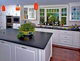 An angled bay is the most common type of bay window that works well in any style or shape of kitchen. 20 Charming Kitchen Spaces With Bay Windows Home Design Lover