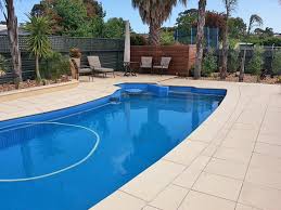 Strategically placed around this enticing pool, these a romantic spot indeed, this intimate sitting area bumps up right next to the luxurious spa. Beachstone Pavers Pool Coping Quantum Stone Adelaide Sa