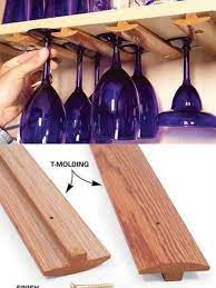 Under shelf wine glass hanger. Repurpose T Molding To Slide Hang Wine Glasses Diy Wine Glass Wine Glass Holders Homemade Bar