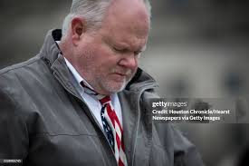 Warner Workman of Virginia lowers his head during an invocation as... News  Photo