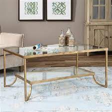 We have mid century modern coffee tables and antique coffee tables as well. Madox Modern Classic Antique Gold Leaf Glass Rectangular Coffee Table 41 W 50 W Kathy Kuo Home