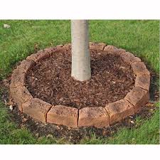 Landscape edging is a material that is used to form a barrier between separate sections of lawn and garden space. Edging Stones For Tree Rings And Landscaping