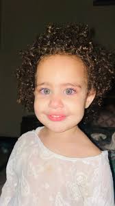 Age: 3 years almost Her hair are even de tangled post bath idk how to brush  her hair I have tried leave in conditioner and detangler spray but still  hair so tangled