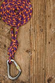Move your mouse over the wallpaper background picture right click on the image, and a menu will appear. Rock Climbing Gear With Rope And Connector On Rustic Wooden Background Stock Photo Picture And Royalty Free Image Image 23044104