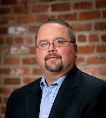 Christopher “C.J.” Rhoades