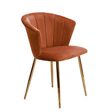 Absolutely necessary for an authentic mcm home. Kendall Velvet Chair Burnt Orange Dunelm