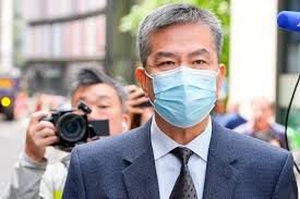 Hong Kong businessman defends home against spies