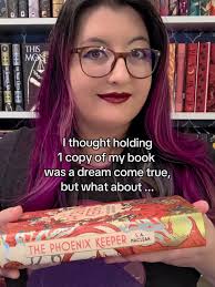 That One with A Man Holding A Old Book