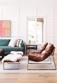 White Wainscoting Wall Detail Abstract Art Over The Sofa Green Sofa Leather Accent C Accent Chairs For Living Room Living Room Leather Living Room Chairs