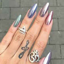 Chrome nails are created by rubbing a powder made of fine metals, glass and pigment over your nail polish, using a soft and spongey eyeshadow brush, until a holographic effect occurs. 20 Cool Chrome Nail Designs Ideas For 2021 The Trend Spotter