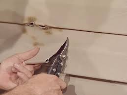 If you have basic carpentry skills, you can handle this. How To Repair Vinyl Siding How Tos Diy