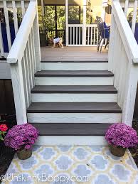 Before opening the can of paint or stain, apply painter's tape to adjacent parts of a house or garage. How To Refinish An Old Wooden Deck Beth Bryan