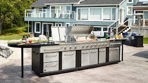 Find inspiration for outdoor kitchen roof ideas such as a canopy, pergola, gazebo some of the possible outdoor kitchen amenities include a seating area, grilling station, refrigerator, and more. Serve Up The Ultimate Outdoor Kitchen Lowe S Canada