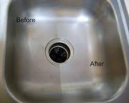 Cleaning A Stainless Steel Sink With Baking Soda And Vinegar Cleaning Hacks Deep Cleaning House Cleaning Tips