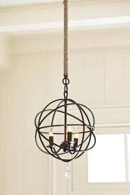 Replace A Cheap Looking Hanging Chain With A Jute Wrapped Pole That Hides The Cord And Looks A Lot Less Fussy Than A Cover Light Cord Cover Home Lighting Home