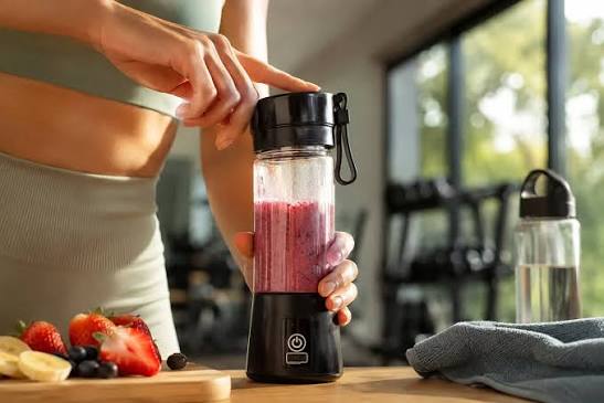 BlendIt portable USB rechargeable blender mixing fresh smoothie ingredients