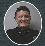 NPD officer charged with domestic assault, false imprisonment