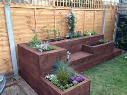 This easy project will help you build a diy tiered raised garden bed using cedar fences and. Tiered Garden Bed Diy