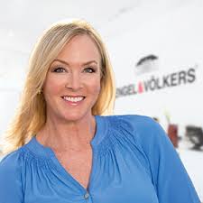 Dolphin pod plays in wake