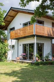 holz100 houses building biology carpentry home decor by abensberger holz100 decoration trends balkon haus holz100 balkon gelander design