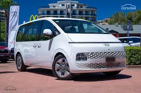 Image result for Creamy White Pearl 2025 Staria