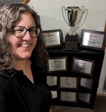 I'm proud to share that the Illinois Press Association's traveling trophy  that goes to the best small nondaily newspaper in the state will be staying  in Oakland for another year! We knew