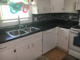 It is used most often on kitchen countertops and bathroom vanities. Laminate Countertop Tile Backsplash Installation Nau Construction Inc